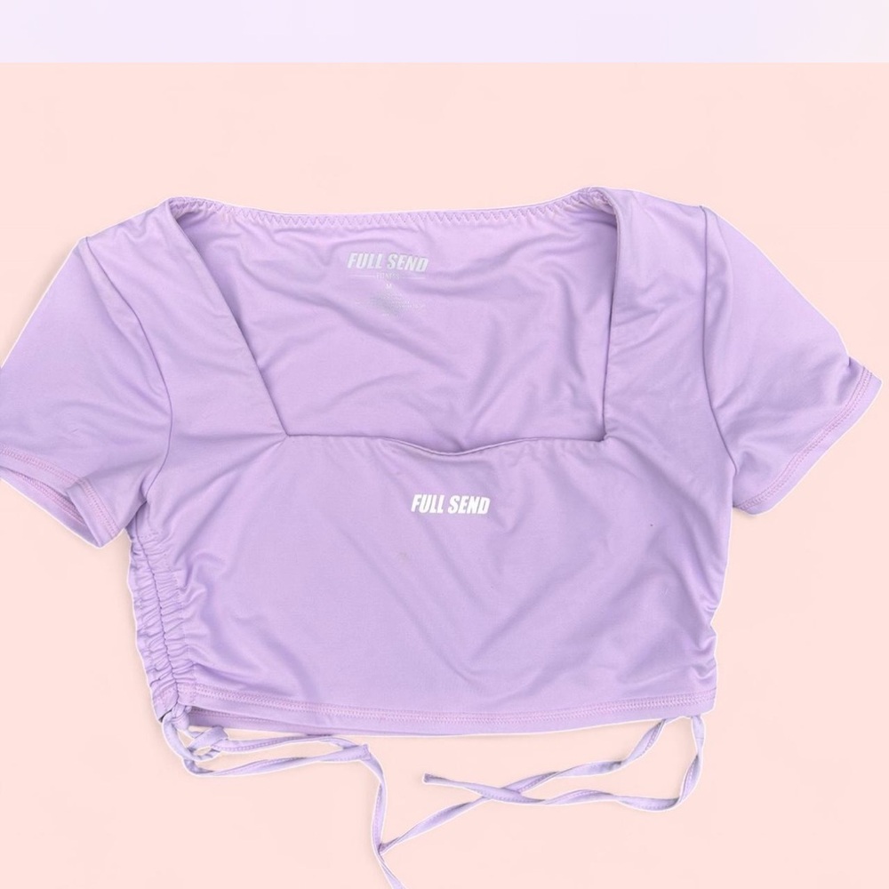 Lilac Full Send fitness crop top.